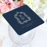Vintage Monogram Wappen Names Navy Blue Wedding Rechteckiger Pappuntersetzer<br><div class="desc">Dieses elegante Design zeichnet sich durch ein verziertes, Vintag inspiriert Wappen von Acanthus-Blätter aus, die zwei Monogramm-Initialen in einem offenen Serifen-Schriftart abrahmen, vertikal gestapelt und durch eine dünne horizontale Linie getrennt sind. Fügen Sie die Namen des Paares und das Trauungsdatum unten hinzu. Design und Text sind in Weiß auf marineblau...</div>