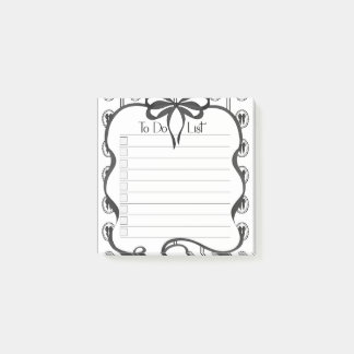 Vintage-Notizblock mit schwarzer Schleife und Chec Post-it Klebezettel