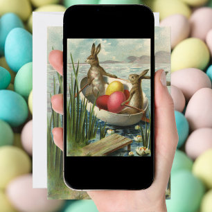 Vintage Osterbrunnen in einem Boot mit Ostereiern Feiertagskarte