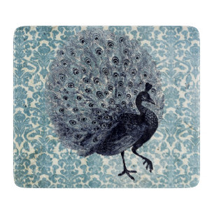 Vintage-Pfau auf blauem Schneidbrett mit quadratis Schneidebrett
