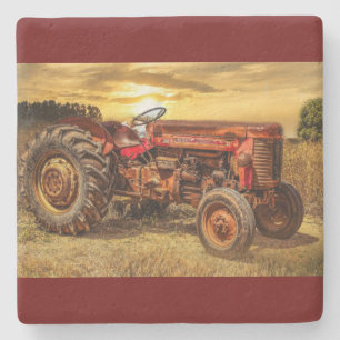 Vintage roter Landtraktor Steinuntersetzer