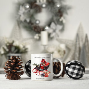 Vintage roter und schwarzer Weihnachtsschlitten un Kaffeetasse