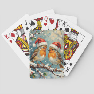 Vintage Rotkehlchen mit Weihnachtsmannmützen auf s Spielkarten
