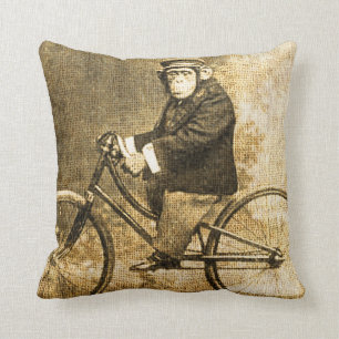 Vintage Schimpanse auf einem Fahrrad Kissen