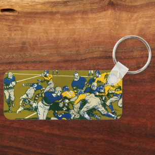 Vintage-Sportsfußballspiel, Gold- gegen Blaue Mann Schlüsselanhänger