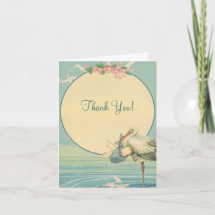 Vintage-Storch-Babyjunge in blauem Decken, Danke