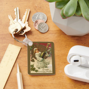 Vintage viktorianischer Neujahrsabend Champagner E Schlüsselanhänger