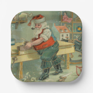 Vintage-Weihnachtskarte - Santa in seiner Werkstat Pappteller