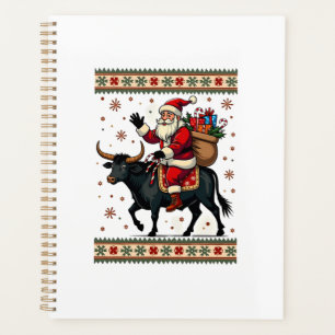 Vintage-Weihnachtsmann reitet auf Highland-Kuh Wei Planer