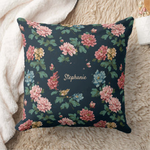 Vintagefarbenes Pfingstrosenmuster auf schwarzem H Kissen