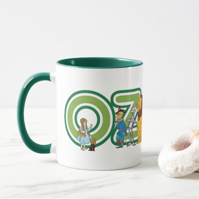 Vintager Assistent für Oz-Zeichen und Textbuchstab Tasse (Mit Donut)
