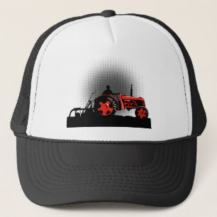 Vintager Bauernhof-Traktor-Bauer, der Seite fährt Truckerkappe