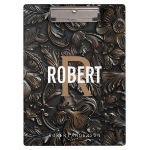 Vintager, dunkelbraun gearbeitete Ledermonogrammna Klemmbrett