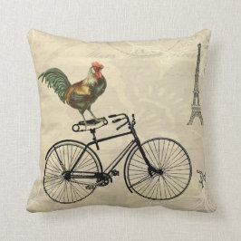 Vintager Hahn, der ein Fahrrad durch den Kissen