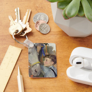 Vintager Junge mit seinem blauen Ribbon-Siegespfer Schlüsselanhänger