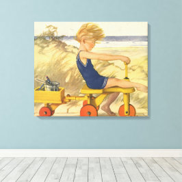 Vintager Junge spielt am Strand mit Sandspielzeug Leinwanddruck