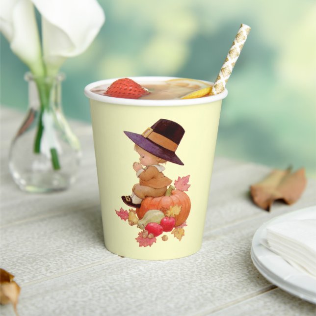 Vintager Pilgrim Boy betet auf Pumpkin Pappbecher (In Situ)