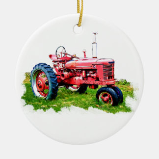 Vintager roter Traktor auf dem Gebiet Keramikornament