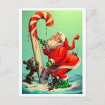 Vintager Weihnachtsmann, der eine Candy Cane gemal Feiertagspostkarte<br><div class="desc">Der Vintage Weihnachtsmann malte eine Bonbons-Cane-Illustration.</div>