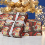 Vintager Weihnachtsmann Geschenkpapier<br><div class="desc">Weihnachtspapier mit dem Bild des fröhlichen Weihnachtsmanns mit seinen roten Fäusten und seiner Mütze,  das eine weiße Kerze ausbläst.</div>