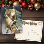 Vintager Weihnachtsmann mit Geschenken Feiertagspostkarte<br><div class="desc">Der legendäre Weihnachtsmann gießt aus einer großen Tasche mit einem Weihnachtsbaum auf den Rücken.</div>