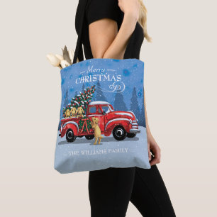 Vintager Weihnachtsroter LKW mit Hunden Familienna