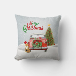 Vintages Auto parkte durch Weihnachtsbaum und Kissen