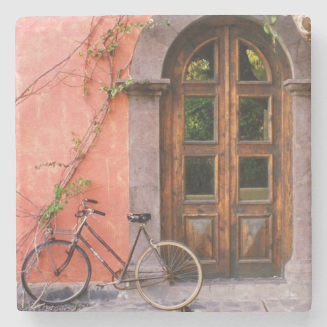 Vintages Fahrrad auf altem Straßenentwurf Steinuntersetzer (Vorderseite)