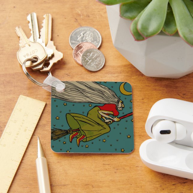 Vintages Halloween, böse Hexe, die auf Broomstick  Schlüsselanhänger (Schreibtisch)