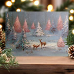 Vintages Hirsch im Schneewald Rosa Weihnachtsbaume Feiertagskarte<br><div class="desc">Vintages Hirsch im Schneewald Pink Weihnachtsbaume Weihnachtskarte. Dieses Design zeichnet sich durch Vintages Hirsch in den schneebedeckten Wäldern aus,  umgeben von rosa Weihnachtsbäumen. Was für eine schöne Retro-Urlaubsszene! Personalisieren Sie dieses maßgeschneiderte Design mit Ihrem eigenen Gruß.</div>