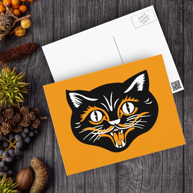 Vintages Katzen-Gesicht Halloweens Postkarte (Happy smiling Halloween black cat face with white accents on orange postcard.)