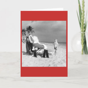 Vintages Kind mit Santa on Beach Card Feiertagskarte