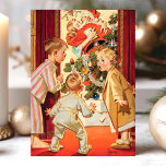 Vintages Mama Küssen Weihnachten<br><div class="desc">Vintage Weihnachtskarte Mommy Kissing Weihnachtsmann. Dieses lustige Design zeigt drei Kinder,  die Mama beim Küssen des Weihnachtsmanns erwischt haben. Was für eine schöne Retro-Urlaubsszene! Personalisieren Sie dieses maßgeschneiderte Design mit Ihrem eigenen Gruß.</div>