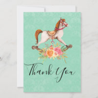 Vintages Rockpferd mit Blumenstrauß