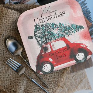 Vintages Rotes Auto mit einem Weihnachtsbaum an Da Pappteller