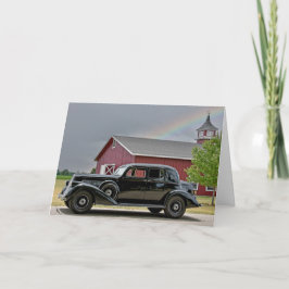 Vintages schwarzes Auto mit Regenbogen Karte