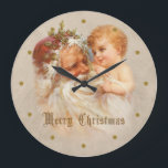Vintages Vater-Weihnachten mit Kind Große Wanduhr<br><div class="desc">Bezaubern und nostalgisches Weihnachtsmann- oder Vater-Weihnachten golden-haariges Kind mit optionalem Gruß der Gold"frohen Weihnachten" und Goldpunkten halten.</div>