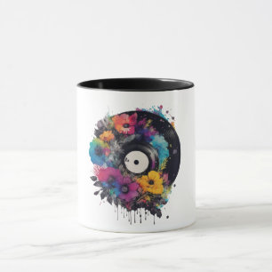 Vinyl Datensatz mit farbigen Blume Tasse