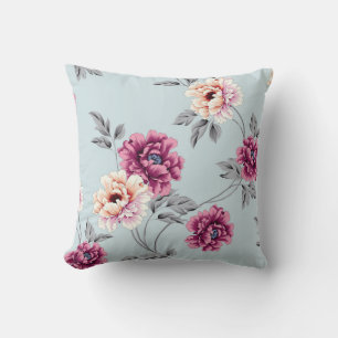 violette und gelbe Blumen mit Blätter auf b Kissen