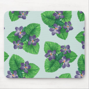Violetten auf blauem Meerglas Mousepad