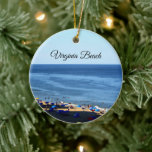 Virginia Beach Round Ornament<br><div class="desc">This round porcelain ornament feature a beachfront image of Virginia Beach, Virginia. The location is written across the top of the image; on the reverse over a light background is a fun detail - the geo coordinates. Kontakt mit mir through Zazzle if you have anfragen about this ornament or would...</div>