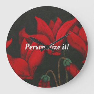 Vivid red Cyclamen on a dark black background Große Wanduhr