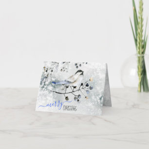 Vogel auf der verschneiten Zweigstelle mit Berries Feiertagskarte