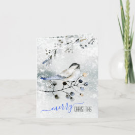 Vogel auf der verschneiten Zweigstelle mit Berries Feiertagskarte