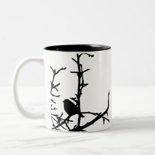 Vogel auf einer Niederlassung Zweifarbige Tasse