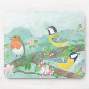 Vögel singen auf einem blühenden Baumzweig Mousepad