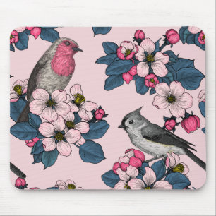 Vögel und Blüten auf rosa Mousepad