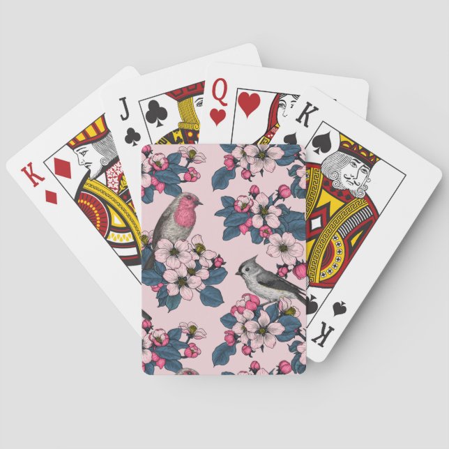 Vögel und Blüten auf rosa Spielkarten (Rückseite)
