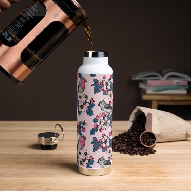 Vögel und Blüten auf rosa Trinkflasche (Kaffee)
