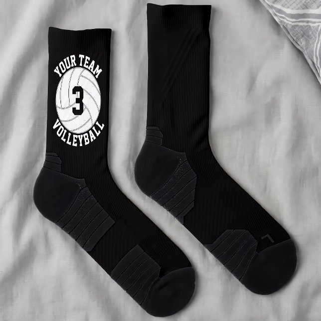Volleyball-Spieler - Name des Teams und Anzahl der Socken (Custom volleyball socks with personalized team name and player number, laying on my bed.)